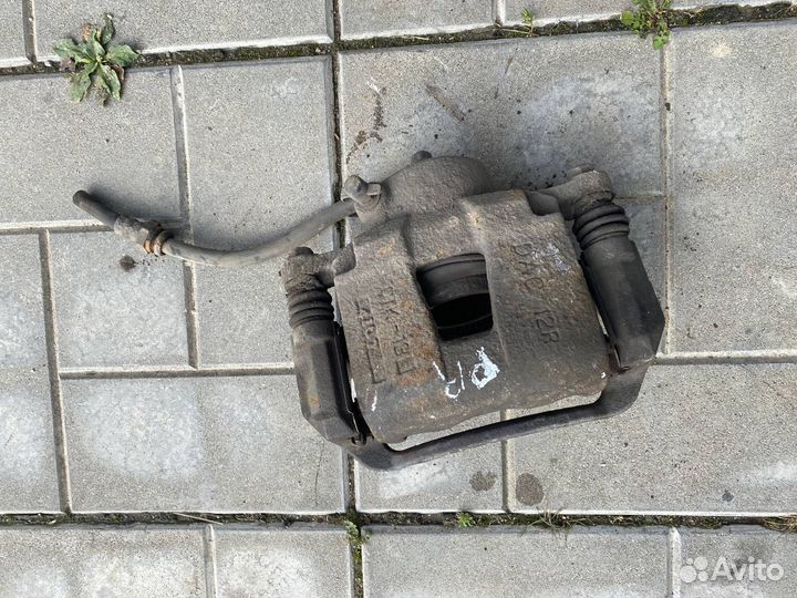 Тормозной суппорт передний правый Chevrolet