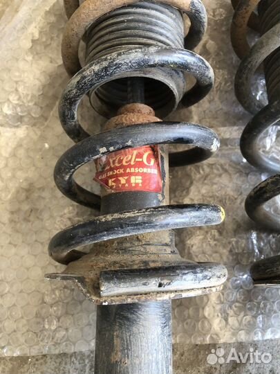 Задние стойки Subaru Legacy