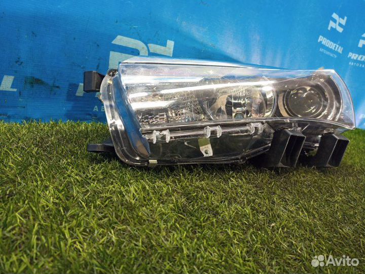 Фара левая Toyota Corolla E18