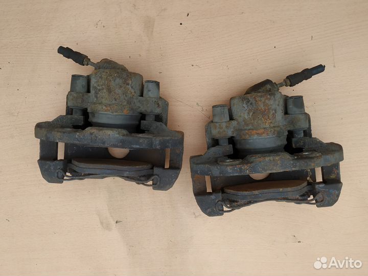 Ford Fusion Суппорт тормозной передний