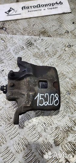 Суппорт тормозной передний левый Nissan Juke F15