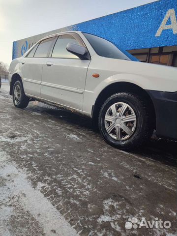 Mazda Familia 1.5 AT, 2002, 290 000 км