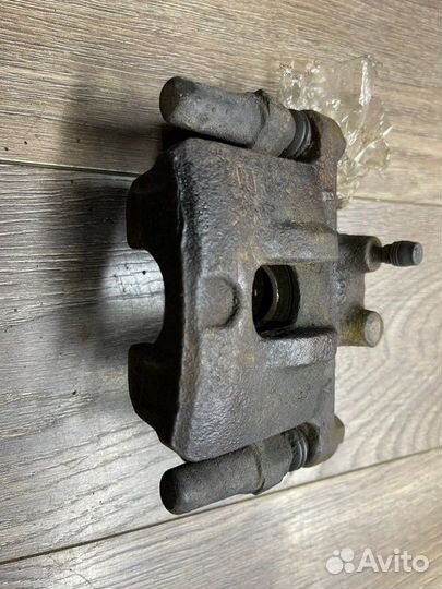 Суппорт задний правый Mitsubishi Lancer 10 седан