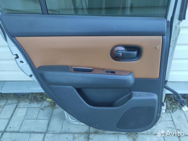 Обшивка двери задняя левая Nissan Tiida C11 1.5