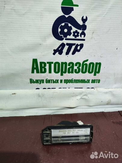 Фонарь подсветки номера Mitsubishi Pajero 4
