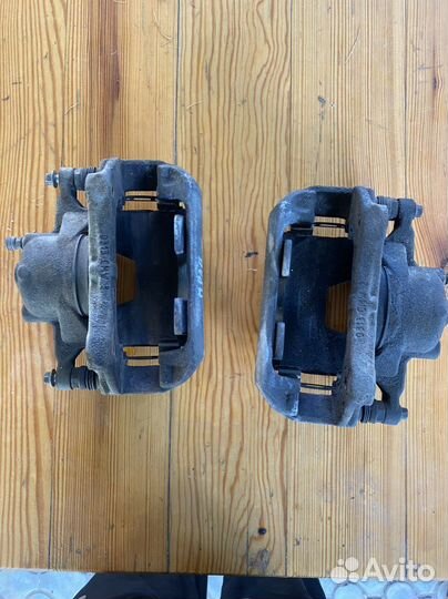 Суппорт передний левый Chevrolet Aveo T300