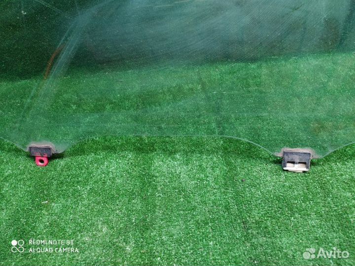 Стекло двери переднее левое Toyota Corolla 120