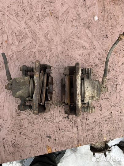 Передние Суппорта Nissan Almera N15 пара