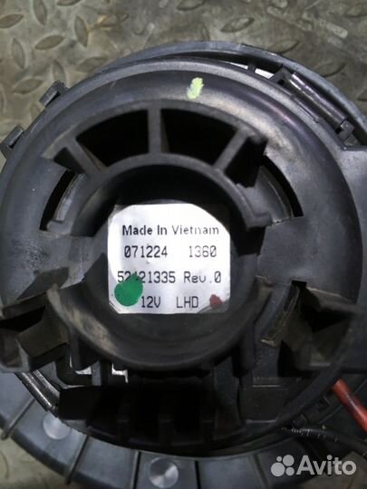 Моторчик отопителя (Opel Astra)