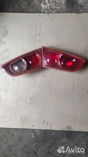 Задание фонари в крышку багажника