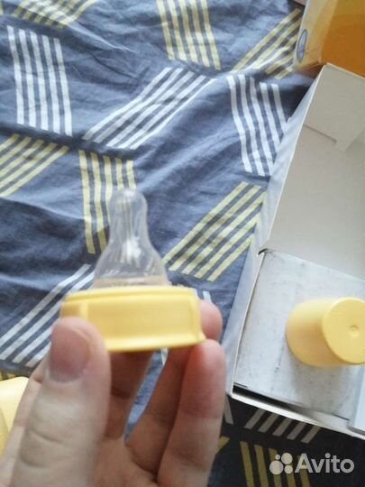 Молокоотсос medela электрический