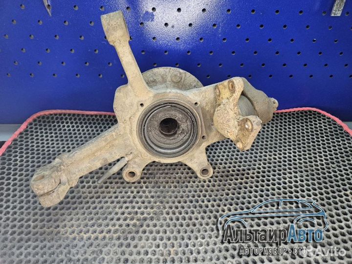 Передний левый поворотный кулак Kia Sportage 1