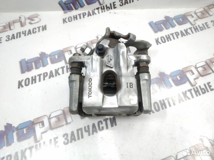 Суппорт задний левый Toyota Corolla 150