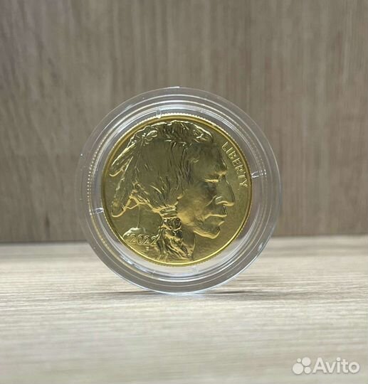 Золотые монеты 31,1г ч.золота