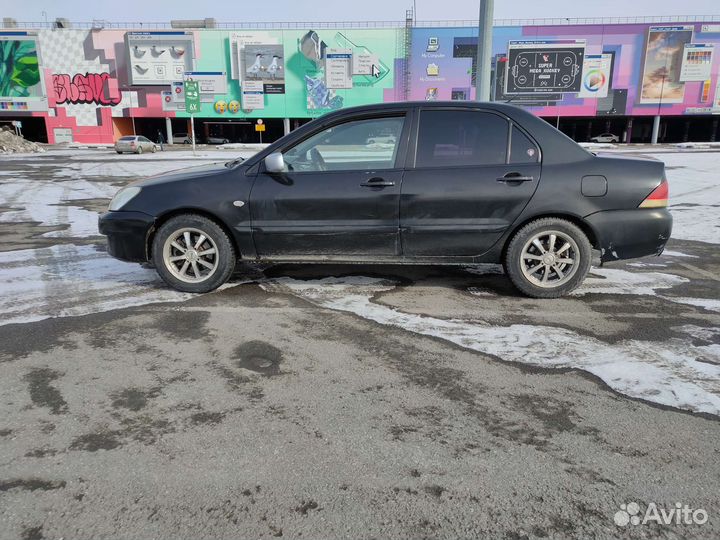 Mitsubishi Lancer 1.6 МТ, 2006, 265 400 км