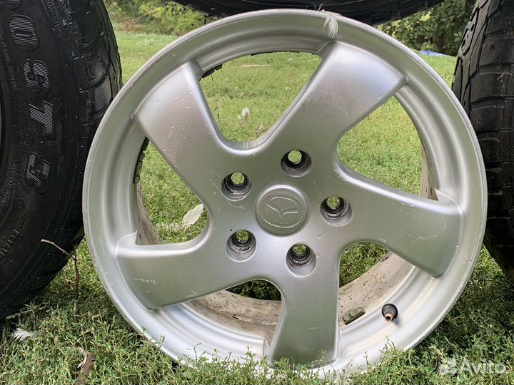 Диски литые mazda r15