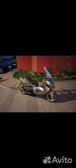 Макси скутер