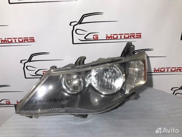 Фара ксеноновая левая Mitsubishi Outlander XL