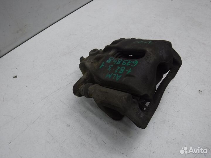 Суппорт тормозной передний левый Nissan Almera 201