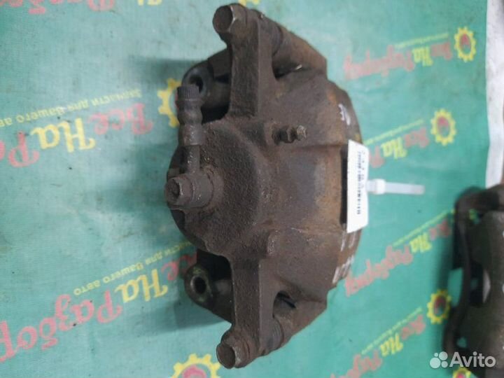 Суппорт передний левый Nissan Qashqai