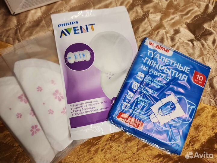 Молокоотсос avent ручной с бутылочкой