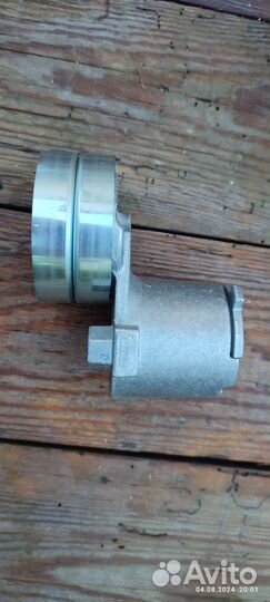 Натяжной механизм с роликом и приводной ремеь