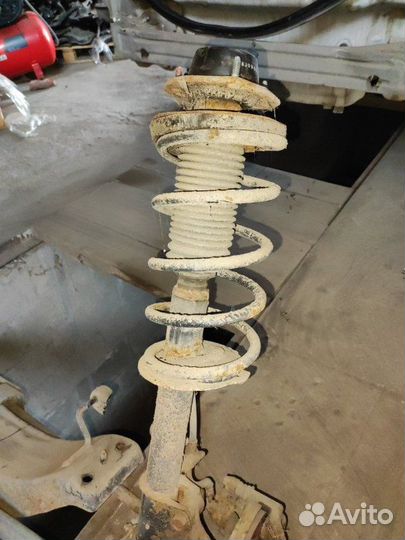 Амортизатор с пружиной задний левый Chevrolet