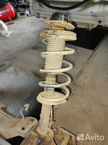 Амортизатор с пружиной задний левый Chevrolet