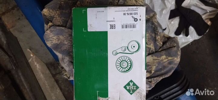 Натяжной ролик