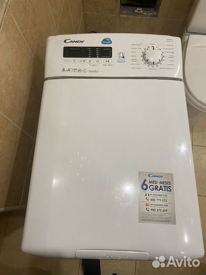 Стиральная машина с вертикальной загрузкой