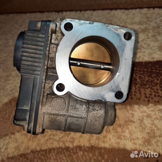 Дроссельная заслонка Nissan Almera b10