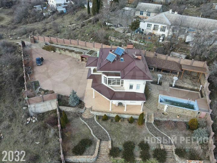 Дом 350 м² на участке 19 сот.