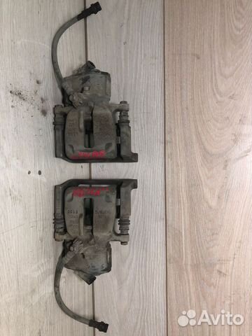 Тормозной суппорт задний лев прав VW Passat B6