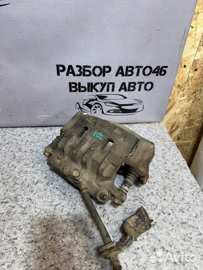 Суппорт передний левый Tociko