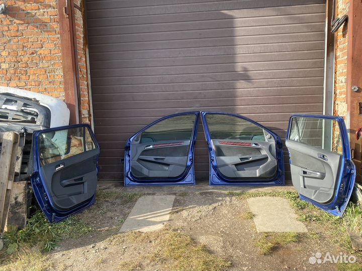 Дверь Opel Astra H