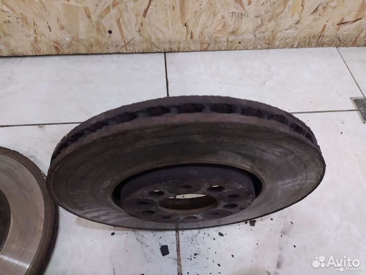 Тормозной диск передний Skoda Rapid