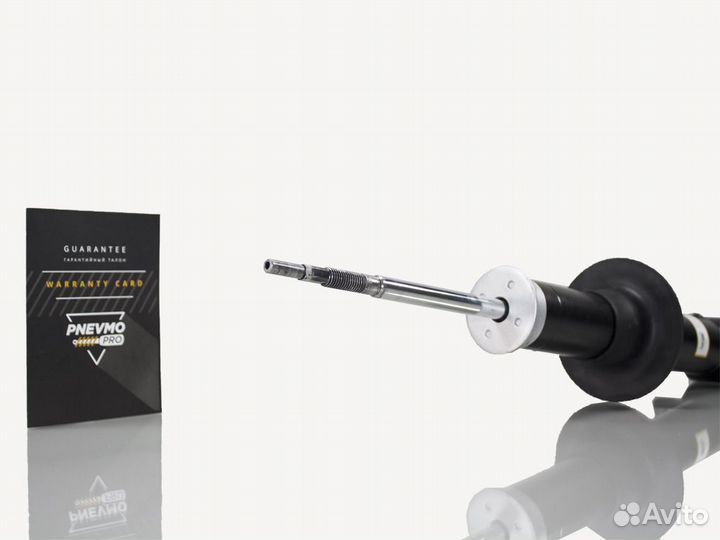 Амортизатор Cadillac Escalade передний под пружину