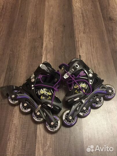 Роликовые коньки