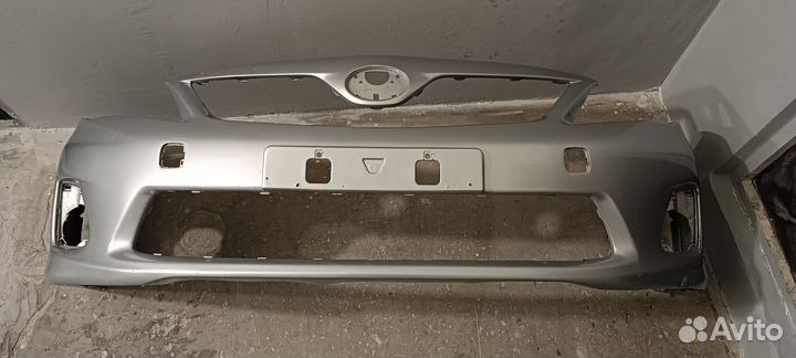 Бампер Toyota Corolla E150 рестайлинг