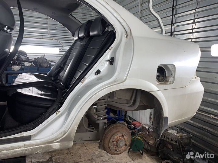 Крыло заднее левое nissan almera classic