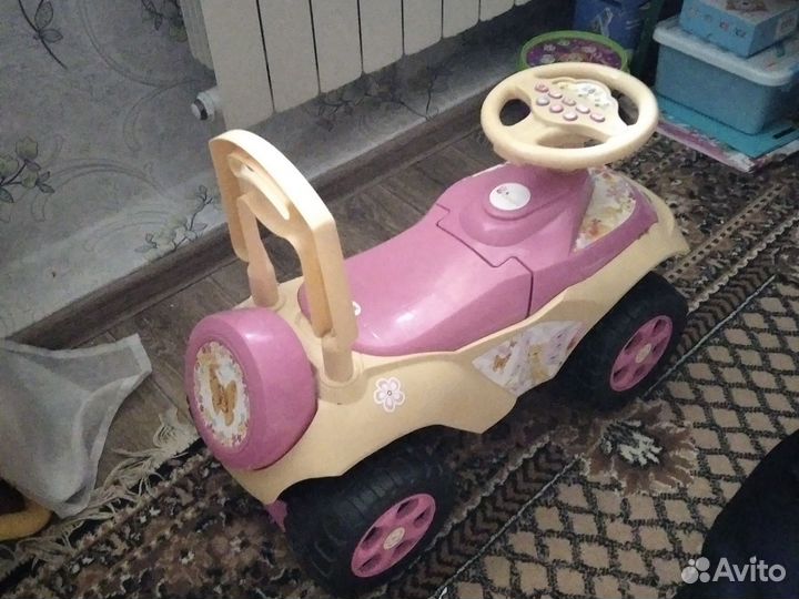 Машинка каталка с муз рулем