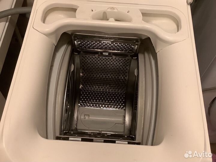 Стиральная машина с вертикальной загрузкой аег