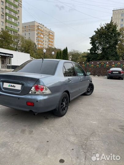 Mitsubishi Lancer 1.6 AT, 2006, 170 000 км