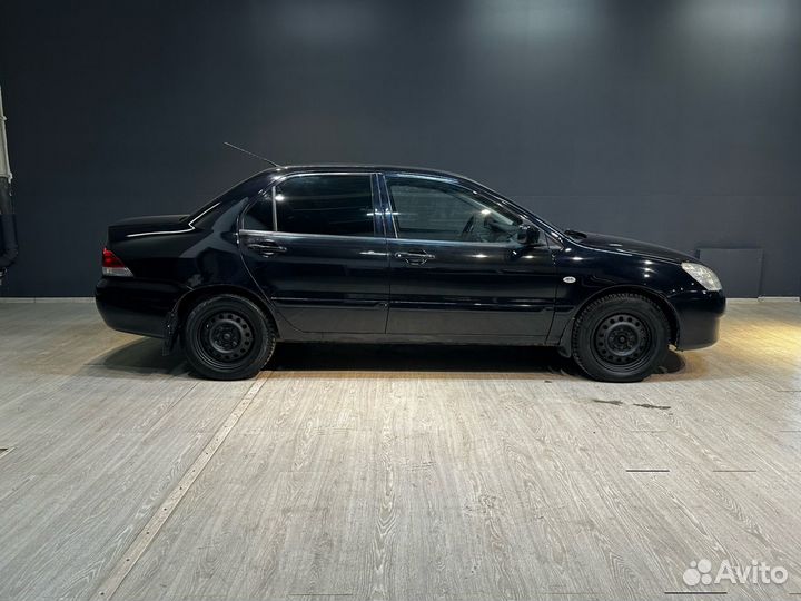 Mitsubishi Lancer 1.3 МТ, 2005, 212 000 км