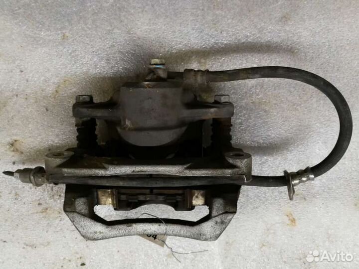 Суппорт тормозной задний левый Subaru Legacy 5