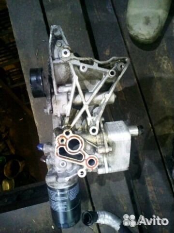 06j903143 кронштейн генератора и кондиционера