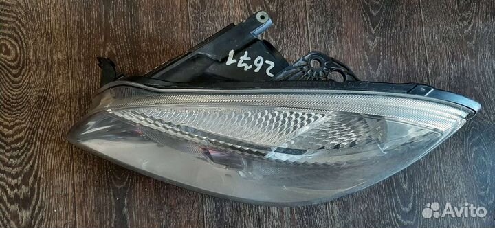 Фара левая Skoda Fabia 2 07-14