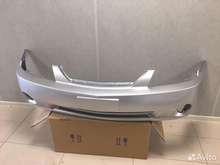 Бампер Kia Spectra серебро