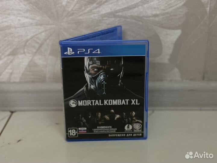 Диск с игрой на PlayStation Mortal Kombat XL