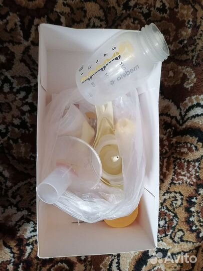 Молокоотсос medela ручной